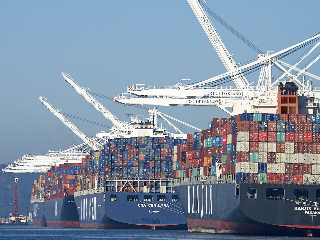 Large Container boats from China unloading at a US Port - How Will Chinese Tariffs Impact the Stacked Stone Industry